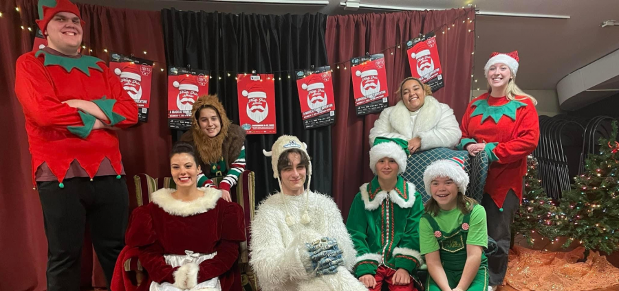 <who>Photo Credit: Contributed </who> North Pole Stories cast members during a dress rehearsal. 