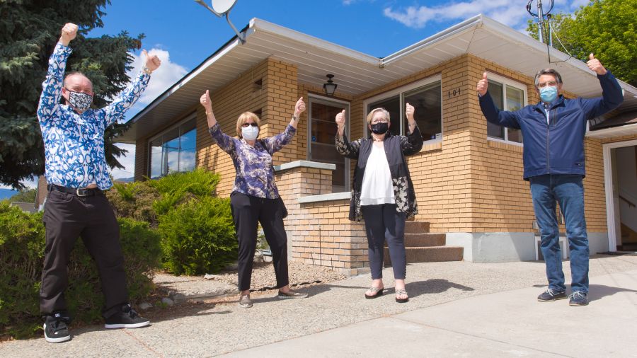 <who>Photo Credit: NowMedia</who> Thumbs up from Discovery House's Jerome Abraham, board member Janet Parker, councilor Judy Sentes, MLA Dan Ashton