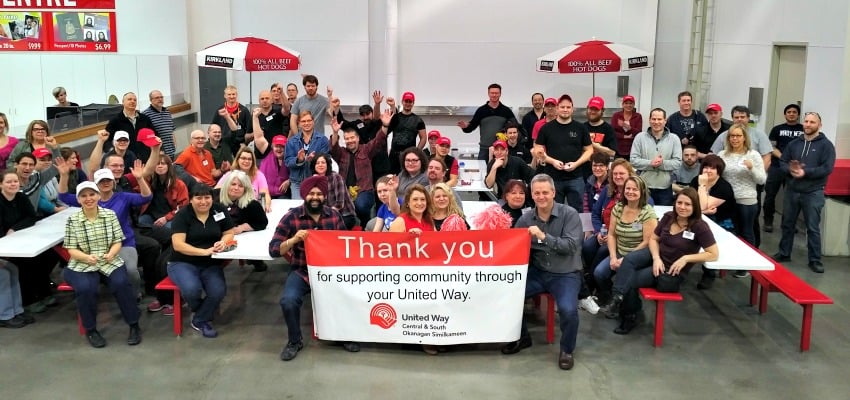 <who> Photo Credit: United Way CSO. </who> Kelowna Costco staff presenting their donation to the United Way. 
