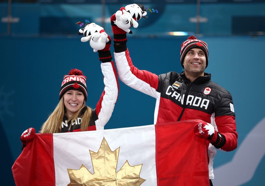 <who>Photo credit: Dan Istitene/Getty Images</who> Gold medal winners Kaitlyn Lawes and John Morris.