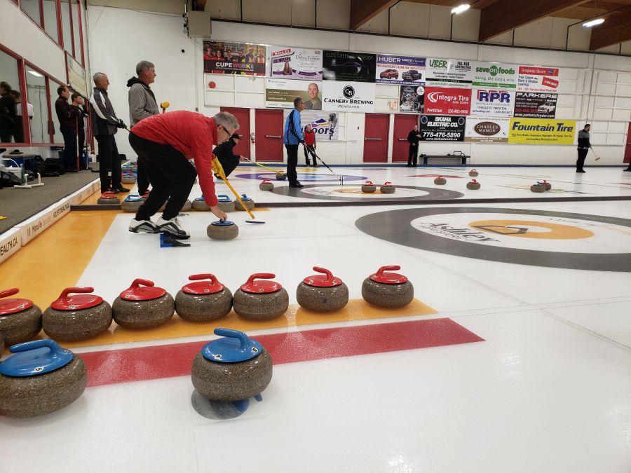<who> Photo Credit: NowMedia </who> Men's league action at the Penticton Curling Club.