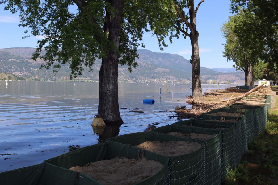<who>Photo Credit: KelownaNow</who>City Park Beach in early June.