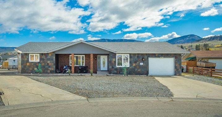</who>This 2,300-square-foot, four-bedroom, three-bathroom house on Sands Court in Kelowna is for sale for $1.1 million, which is just a little less than the benchmark selling price of $1.132 million for a typical house in April.
