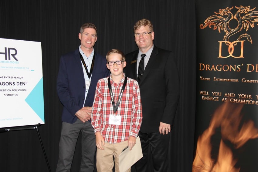 From L to R: Mike Checkley, QHR Technologies (title sponsor), Teagan Adams, First Place Middle School and Kevin Kaardahl, SD23 Superintendent of Schools.