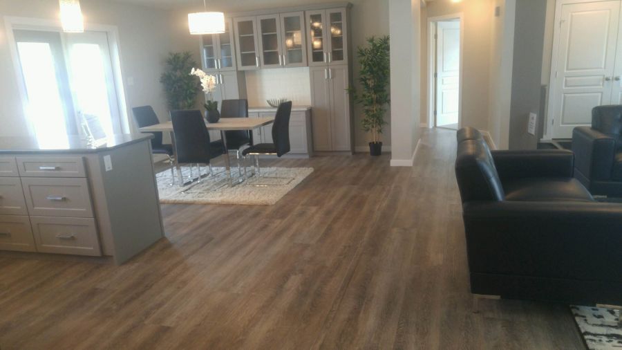 <who>Photo Credit: PentictonNow </who>The Juniper model is the most expensive sold by Jandel Homes Ltd. The three-bedroom, two-bathroom unit has just under 1,800 square feet of living space.