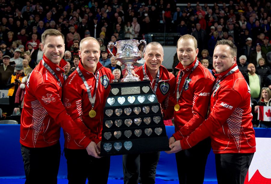 <who>Photo Credit: Curling Canada</who>Brad Gushue's rink celebrates another Brier title in 2023, their 3rd over the past 4 years.