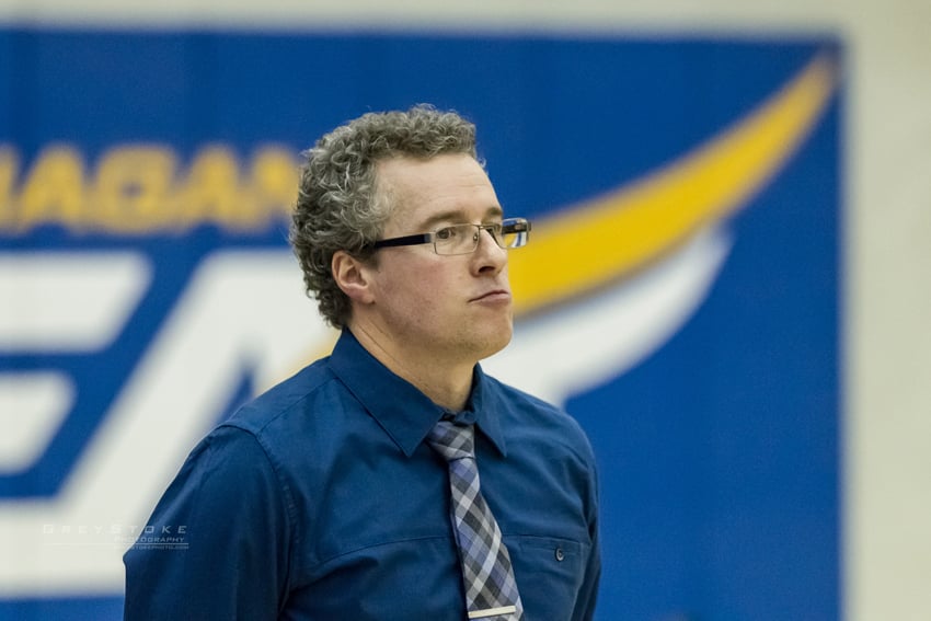 <who>Photo Credit: Greystoke Photography </who>Canada West coach of the year, Steve Manuel, pondering his next move during the Canada West final.