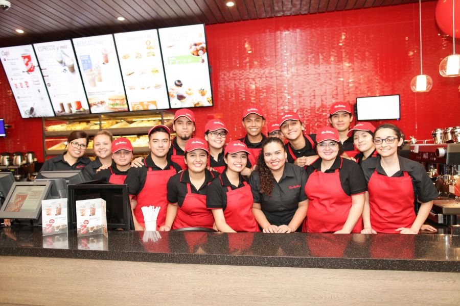 <who>Photo Credit: Contributed</who>The first Tim Hortons' team of staff.