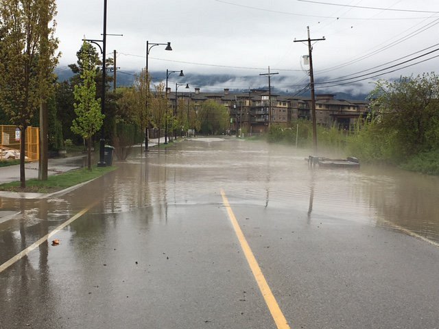 <who> Photo Credit: District of West Kelowna. </who> Flooding on Gellatly Road.