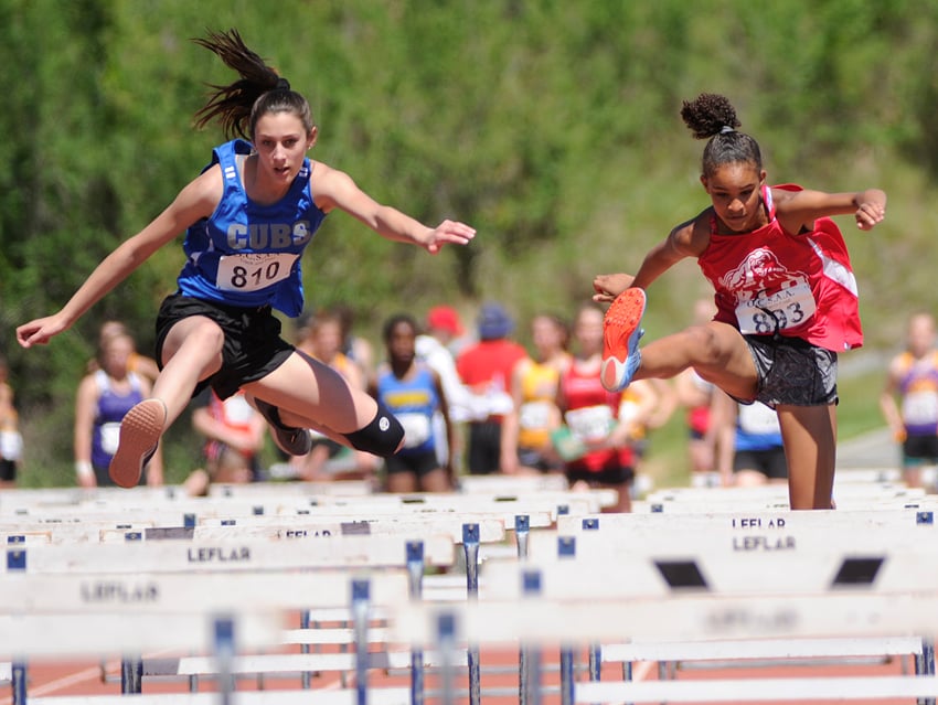 <who>Photo Credit: Lorne White/KelownaNow </who>Elayna Glen, left, of the CNB Cubs claimed two firsts and a second while Mekhila Brown of KLO ran to a first and jumped to a pair of seconds.