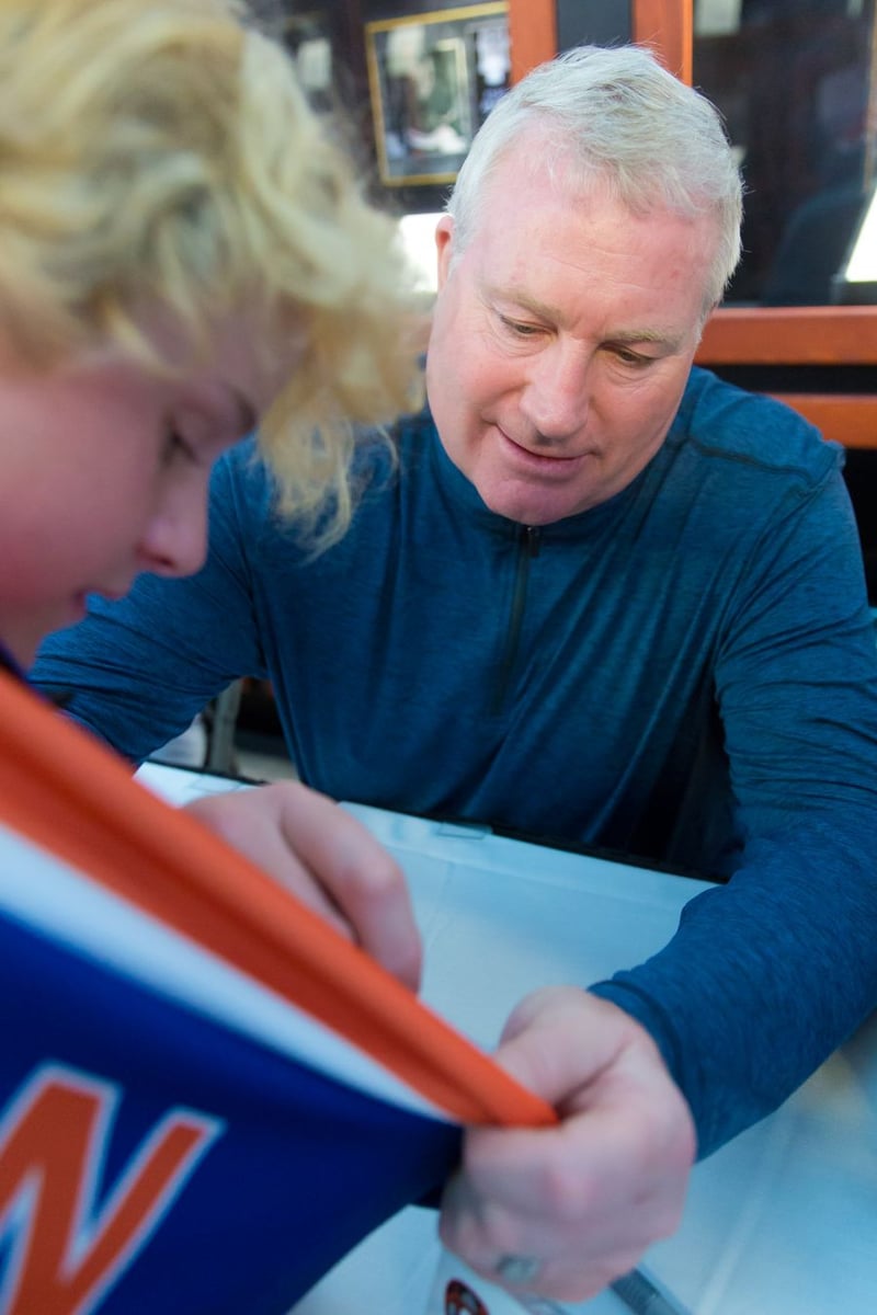 <who>Photo Credit: NowMedia</who> Marty McSorley autographs a jersey