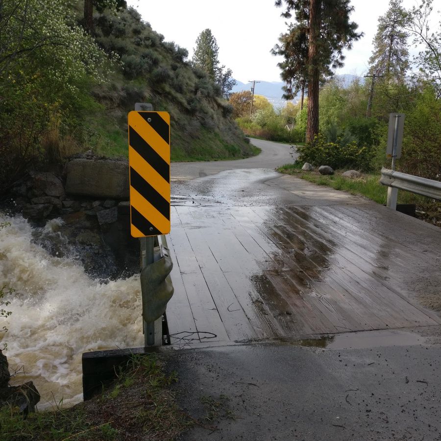<who>Photo Credit: CCSS</who> A torrent of water passes under the bridge