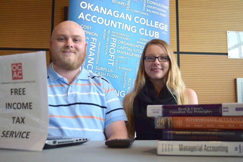 Okanagan College Accounting Club volunteers Alex Urbanovitch and Jessica Belanger manning the free CVITP tax clinics on campus.