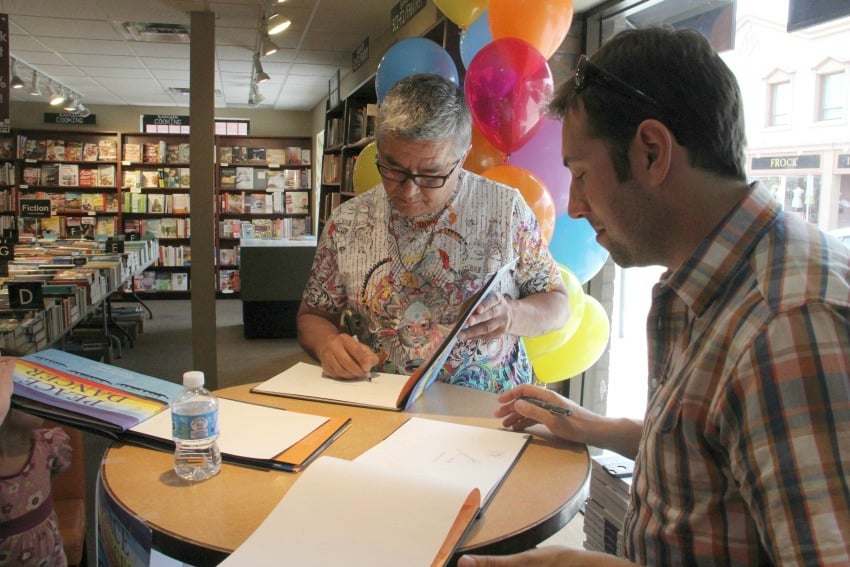 People lined up to the back of the bookstore to get copies of Vickers' and Budd's books on Sunday.