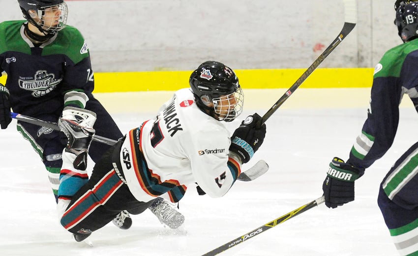 <who>Photo Credit: Lorne White/KelownaNow </who>Okanagan Rockets' captain, Eli Zummack is brought down after taking a shot on the Fraser Valley goal on Sunday.