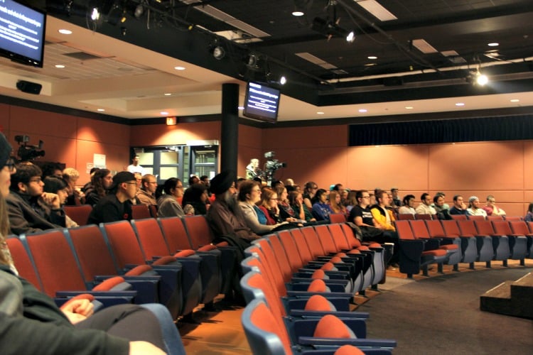 <who> Photo Credit: KelownaNow.com. </who> The audience at Tuesday evening's seminar. 