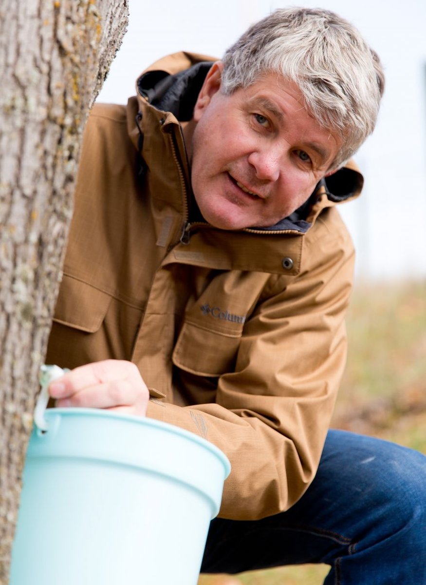 <who>Photo Credit: NowMedia</who>Roch Fortin at one of the local maple trees they'll tap in February.