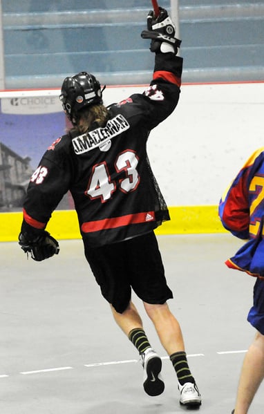<who>KelownaNow </who>Jared MacLennan celebrates one of his four goals in the <br>Kelowna Raiders' 15-8 victory over the Kamloops Rattlers.