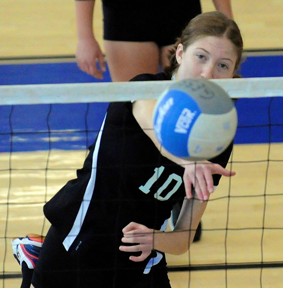 <who>Photo Credit: Lorne White/KelownaNow </who>George Elliot's Georgia Maclean hits for a point against the Kelowna Owls.