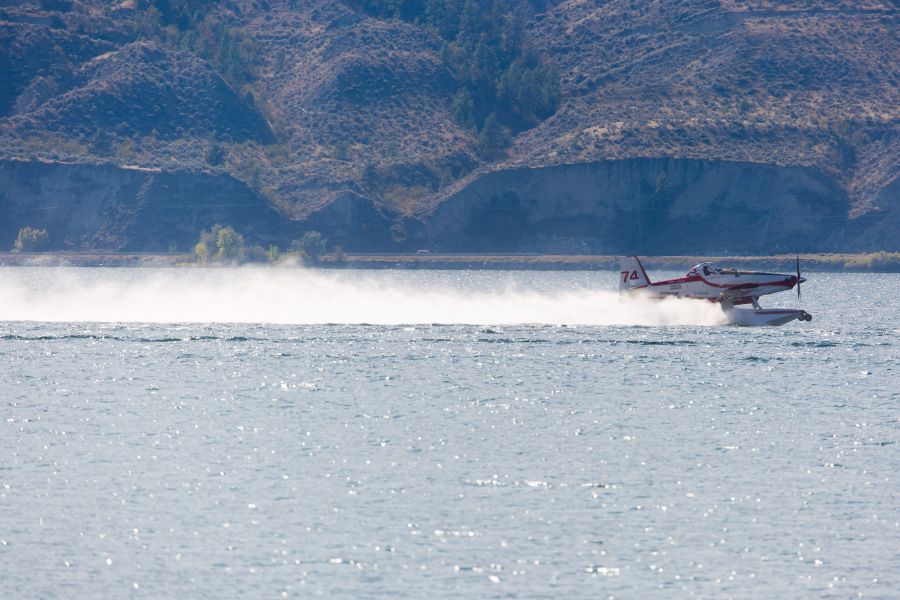 <who>Photo Credit:NowMedia</who> A "skimmer" fighting the Kerr Creek wildfire Wednesday afternoon collects water from Okanagan Lake