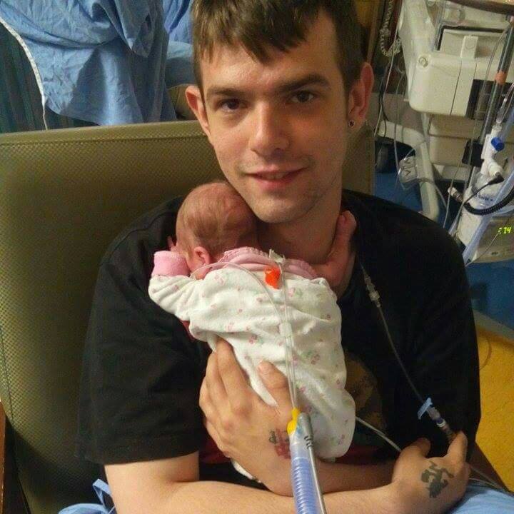 <who> Photo Credit: Justin Pierce/Facebook </who> Justin with Mary-Jane shortly after she was born.