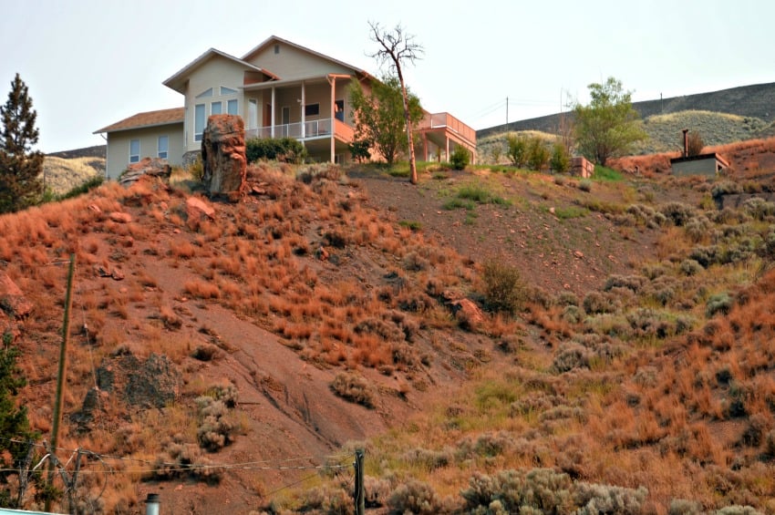 A fire retardant-soaked hillside in Cache Creek after evacuation orders were lifted earlier this month.
