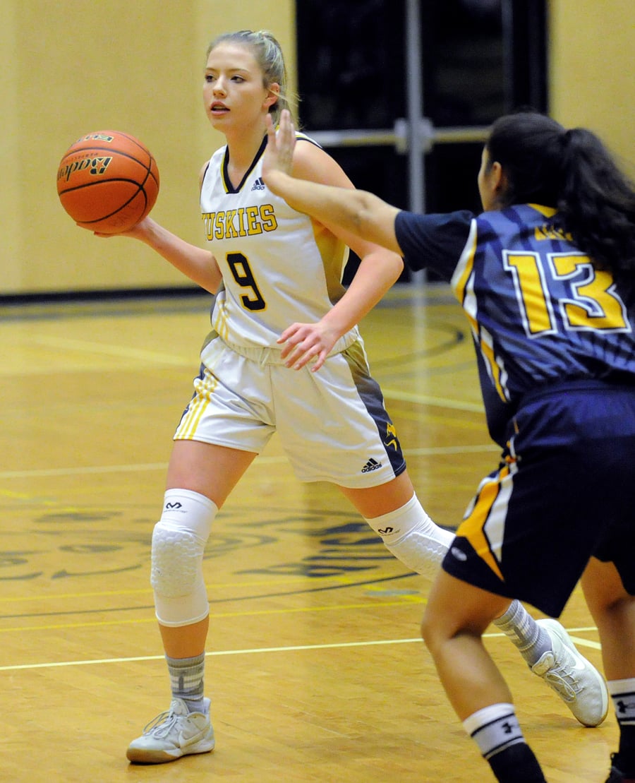 <who>Photo Credit: Lorne White/KelownaNow </who>Lily Pink's 16 points was tops for OKM against the Kelowna Owls.