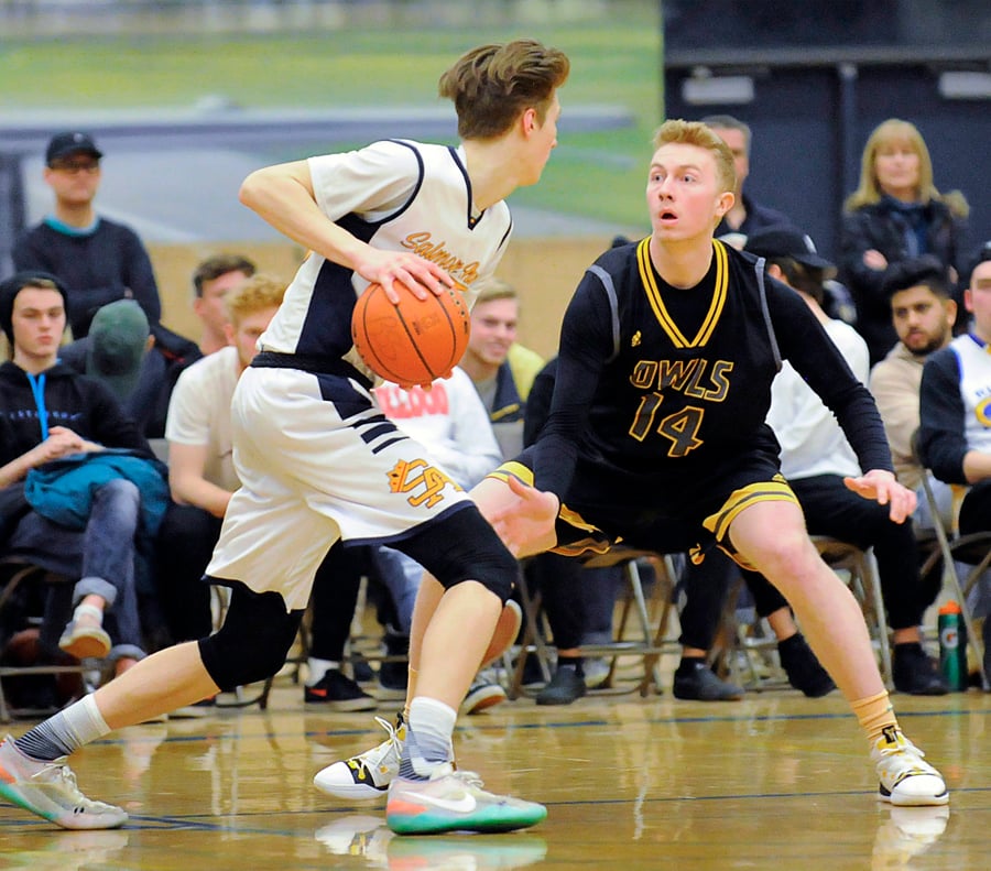 The Owls' Kieran Chalmers goes on the defence against Salmon Arm in the Valley's title game.