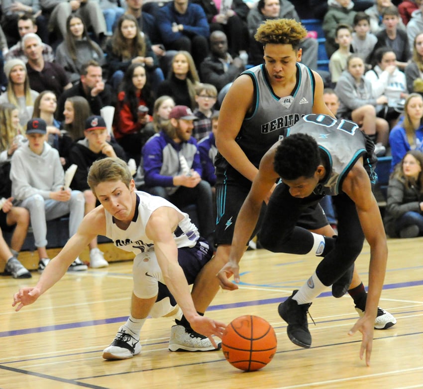 <who>Photo Credit: Lorne White/KelownaNow </who>Jackson Borne, left, of the KCS Knights and HCS Saints' Raymond Barrett, right, and Joshua Weekes will all be key figures for their respective teams at the B.C. School Sports provincial senior A tournament this week.