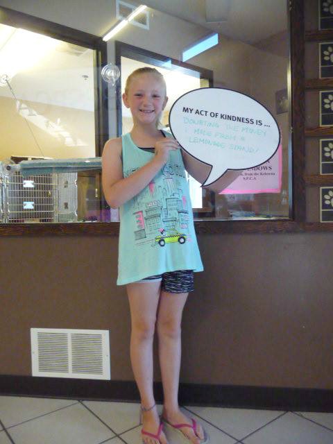 <who> Photo Credit: BC SPCA. </who> On Sunday, Gabriella donated money she raised from a lemonade stand towards the animals at the BC SPCA Kelowna Branch.