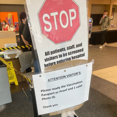 </who>This is one of the signs at Kelowna General Hospital warning visitors to have their vaccination passport ready.
