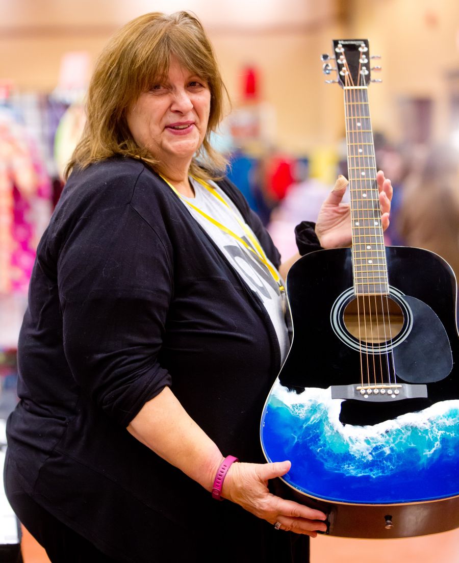 Karen Nelson with a way cool acoustic guitar
