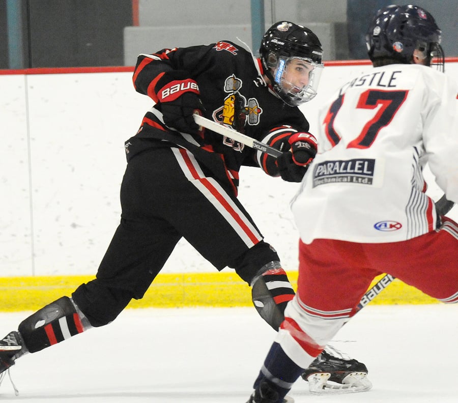 Defenceman Ty Marchant follows through on a shot from the point.