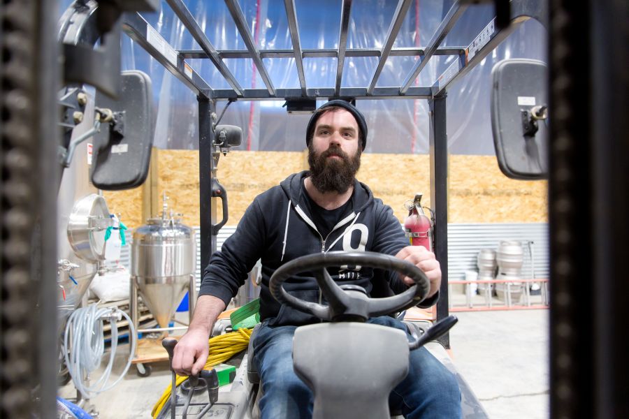 <who>Photo credit: NowMedia</who>Chris Vandenberg works the forklift.