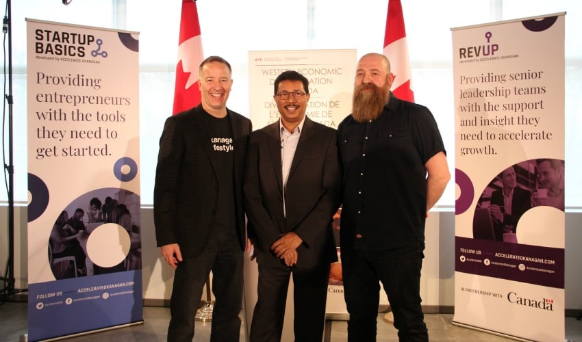 <who> Photo Credit: KelownaNow </who> Left to Right: Stephen Fuhr, MP for Kelowna-Lake Country; Raghwa Gopal, CEO of Accelerate Okanagan; Lincoln Smith, executive director of Kamloops Innovation.