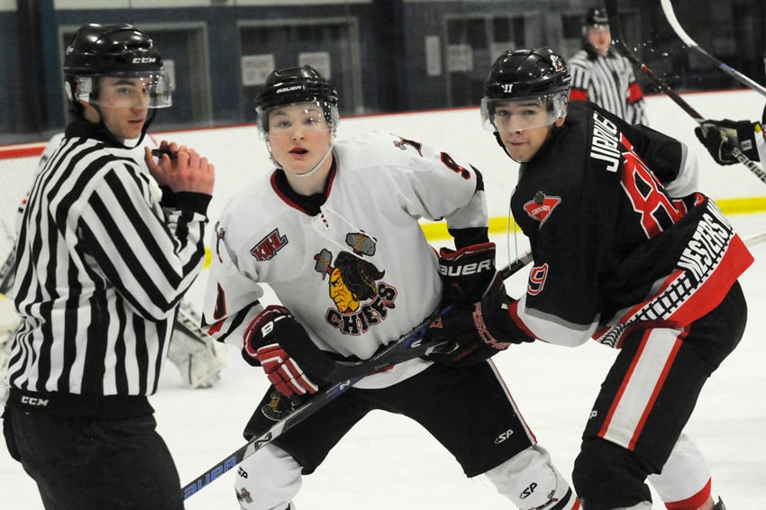 <who>Photo Credit: Lorne White/NowMedia </who>Brody Dale, centre, scored once and assisted on five other goals in the Chiefs' 11-4 win over Steam.