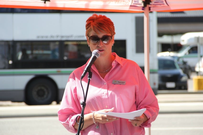 Festivals Kelowna executive director Renata Mills speaking at an event to start off Pianos in Parks 2016.