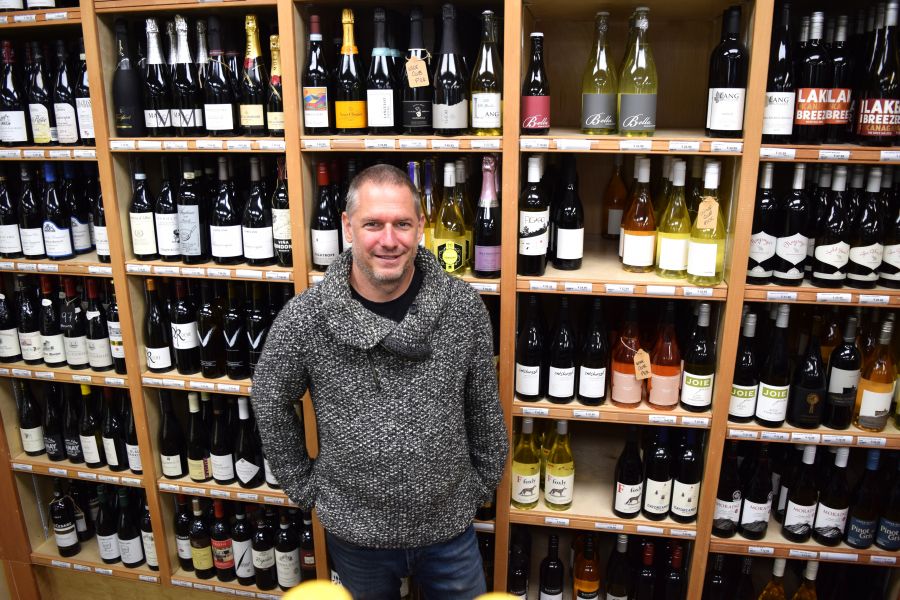 </who>Sommelier Mike Bernardo shows off some of the Naramata General Store's incredible selection of local and international wines.
