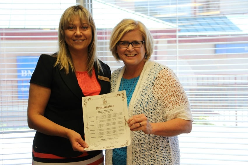 <who> Photo Credit: KelownaNow.com </who> (l to r) Councillor Tracy Gray and Blood Services Territory Manager Gayle Voyer.