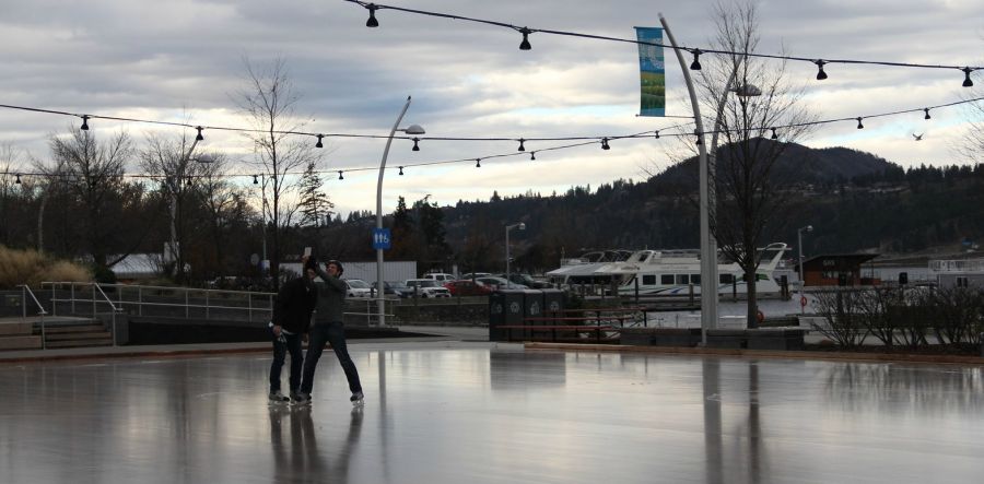 <who>Photo Credit: KelownaNow</who>These two men were the second and third skaters on the ice this year and they have the selfie to prove it!