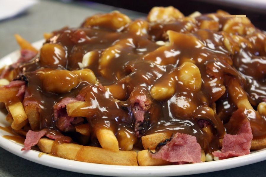 <who> Photo Credit: MTL </who> Looking at that delicious poutine, who could disagree that gravy and cheese is the way to go!