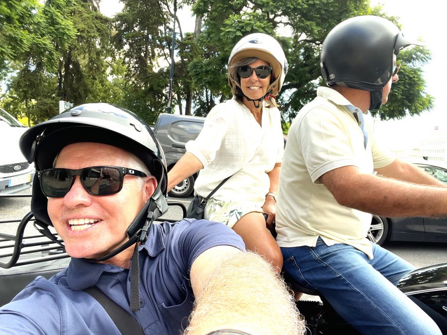 </who> A hard-to-snap selfie with Steve MacNaull in the sidecar, left, his wife, Kerry, on the back of the motorcycle and Jorge Vasconcelos driving.