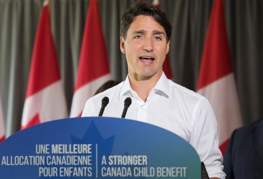 <who>Photo Credit: Canadian Press</who>Trudeau spoke to reporters in Quebec today.