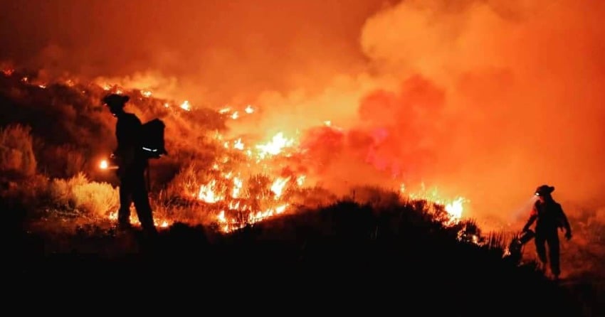 Crews patrolling containment lines at the Mount Eneas wildfire.
