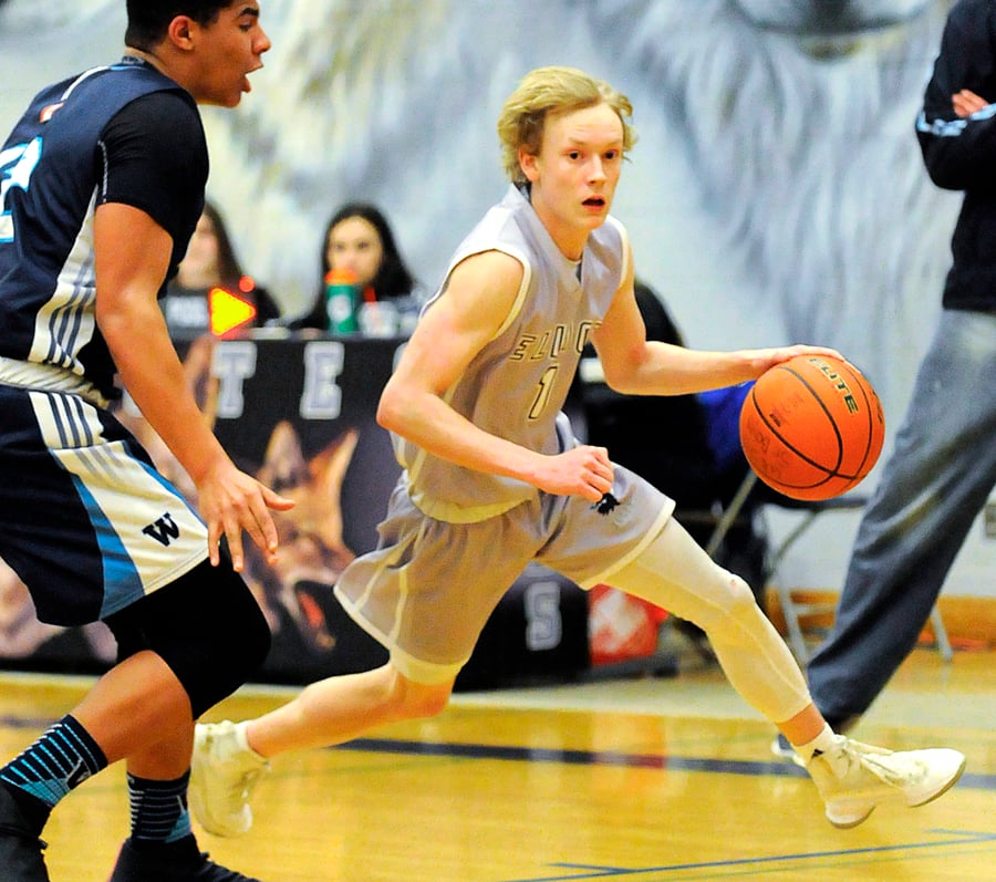 <who>Photo Credit: Lorne White/KelownaNow </who>Guard Ben Hitchens was a key contributor to the Coyotes' first Valley title since 1991.
