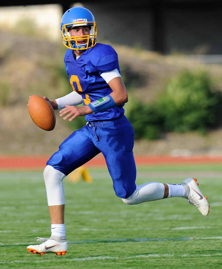 <who>Photo Credit: Lorne White/KelownaNow </who>Rutland QB Liam Attwood was good on nine of 10 passes for 155 yards.