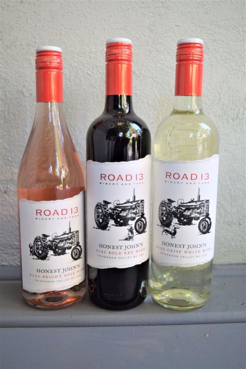 </who>Road 13's Honest John's label features, from left, 2022 Bright Rose ($21), 2021 Bold Red ($24) and 2022 Crisp White ($21).