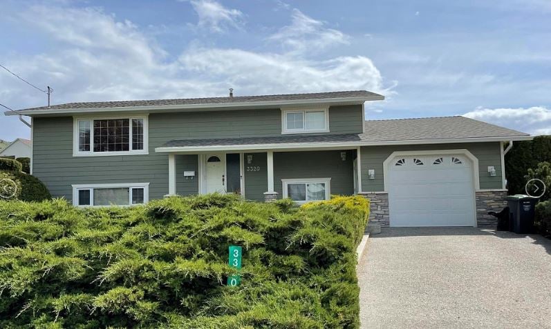 </who>This 2,100-square-foot, three-bedroom, two-bathroom home on Arvid Court in Kelowna is listed for sale for $1,050,000, which is just a little less than the July benchmark selling price of $1,060,000.