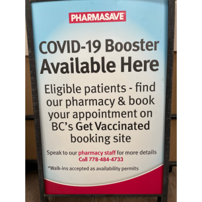 </who>Signs like this encourage people to get their COVID booster shot.