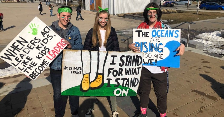 <who> Photo Credit: NowMedia </who> Kelowna Youth Climate Strike organizers Aidan Kenny, Lauren Moody and Joshua Mcissac.